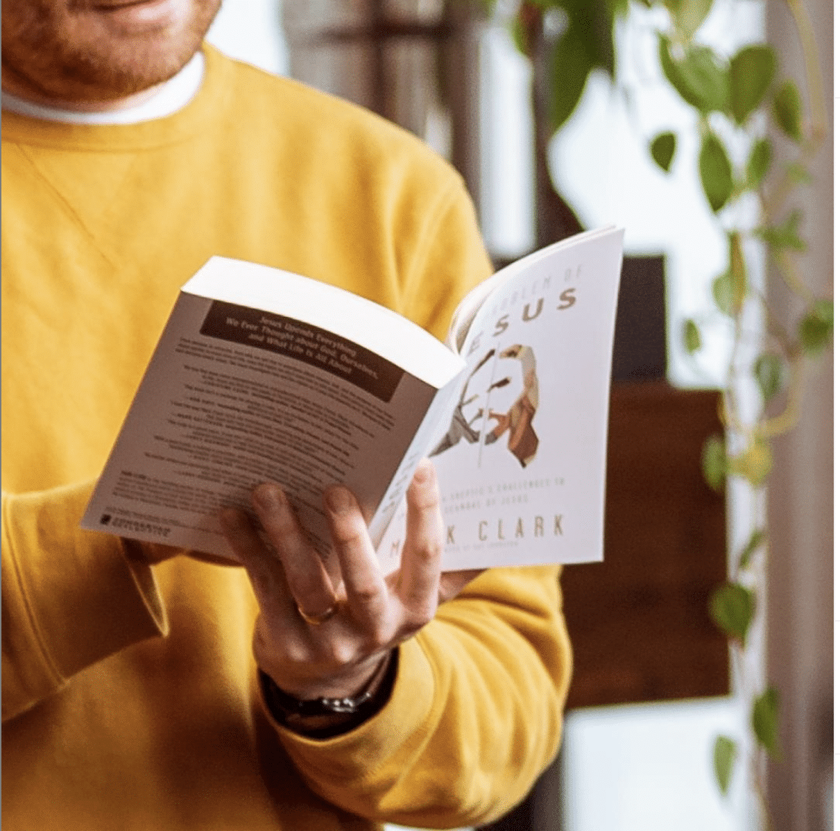 A man reading a book.